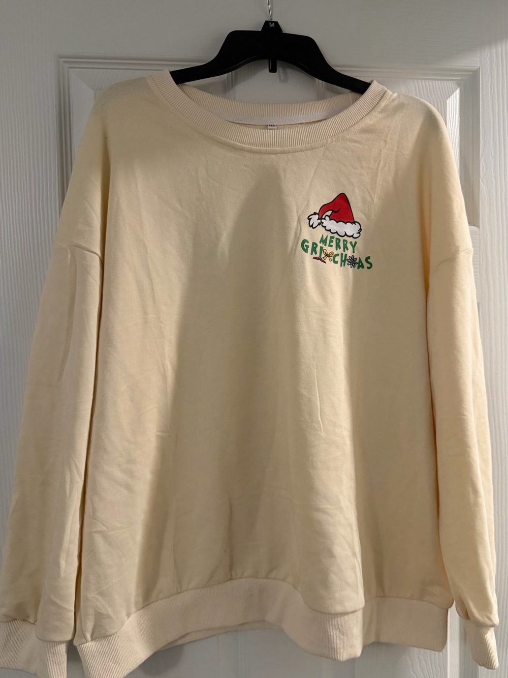 Cream "Merry Grinchmas" Graphic Sweatshirt